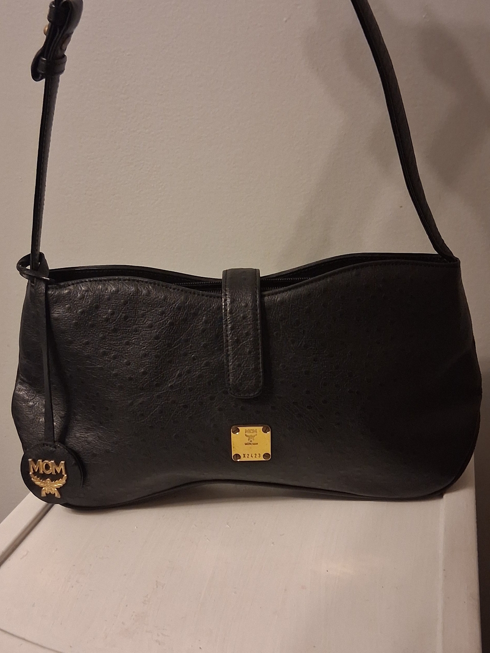 MCM Black Leather Shoulder Bag with Gold Accents